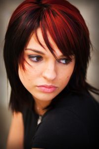 brunette woman with pensive facial expression